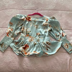 Fashion nova floral blouse in size medium